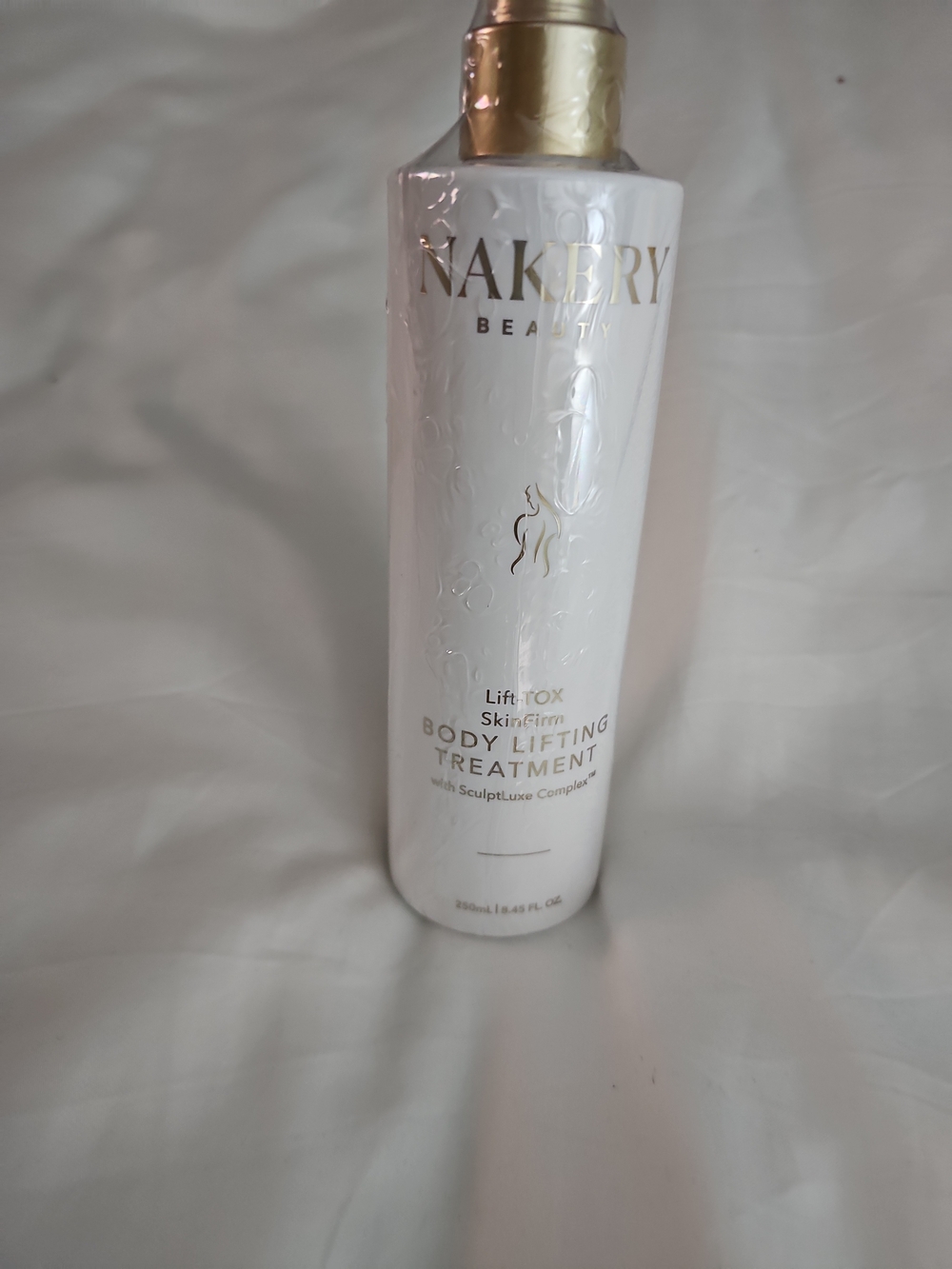 Nakery Beauty Body Lifting Treatment - White & Gold Bottle